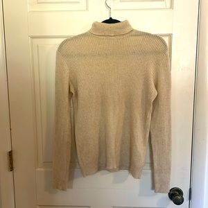 100% cashmere turtleneck from Scotland. It’s a large but runs like a medium